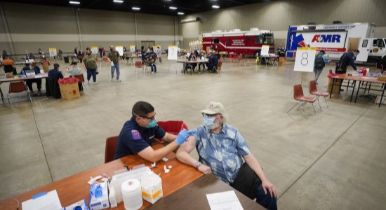 To Streamline COVID-19 Inoculations, Texas will Start Sending Doses to Large Vaccination Hubs